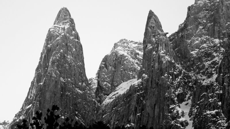 Black and white photo of imposing rocky spires in Montenegro.