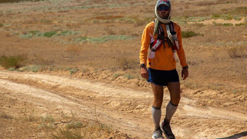 Jamie Maddison warming down after a long and hot stretch of running in the Saryesik-Atyrau desert in Kazakhstan.