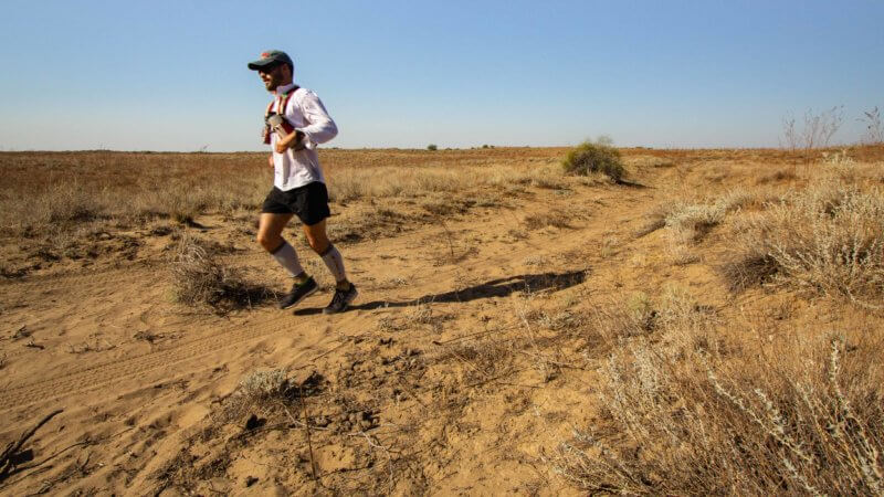 Ultra running across the Saryesik-Atyrau Desert in Kazakhstan.